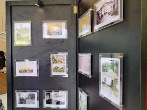 Papan display foto-foto Palembang di masa lalu pada Rakernas 9 JKPI di Palembang.